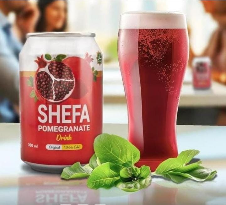 SHEFA Pomegranate Juice Drink can poured into a glass, filled and canned by Fillerco